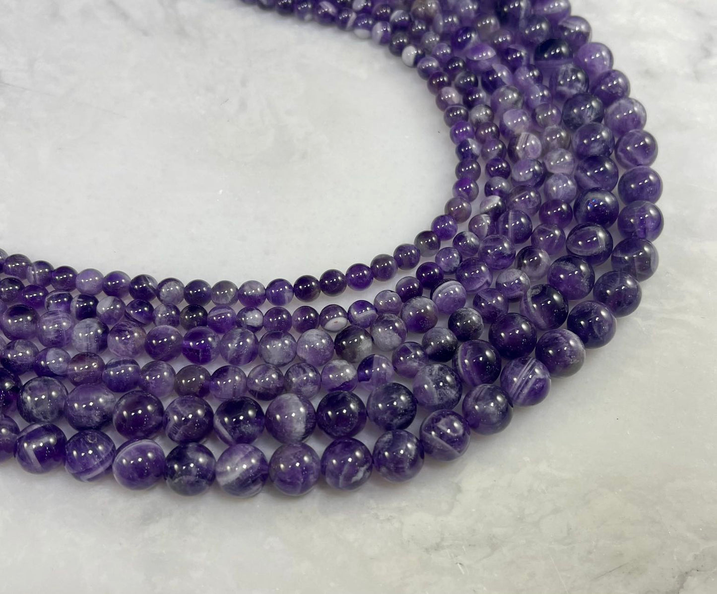 Dog Tooth Amethyst Round-1